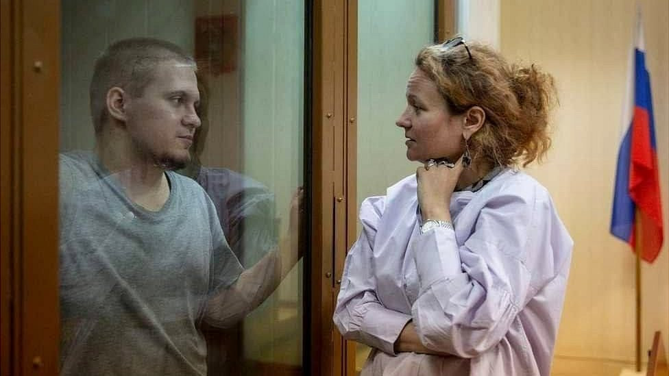 Russian anti-war protester Dima Ivanov with his lawyer Maria Eismont