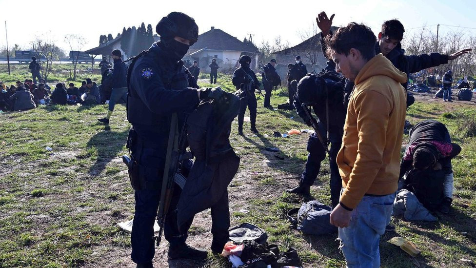 policija, migranti