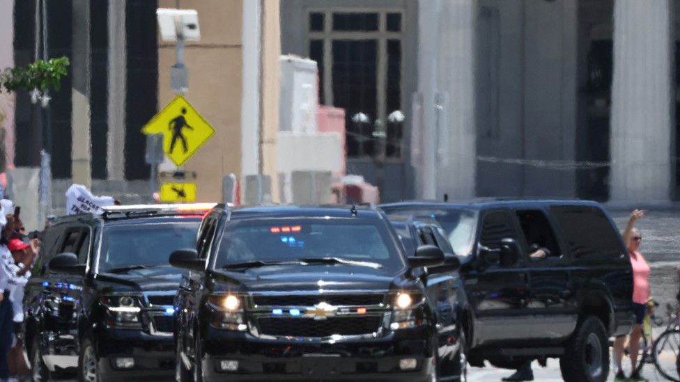 The motorcade former U.S. President Donald Trump arrives at the Wilkie D. Ferguson Jr. United States Courthouse