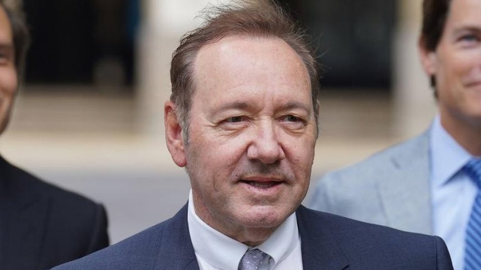 Actor Kevin Spacey (centre) arrives at Southwark Crown Court