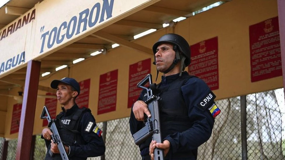 Armed police guarding the prison