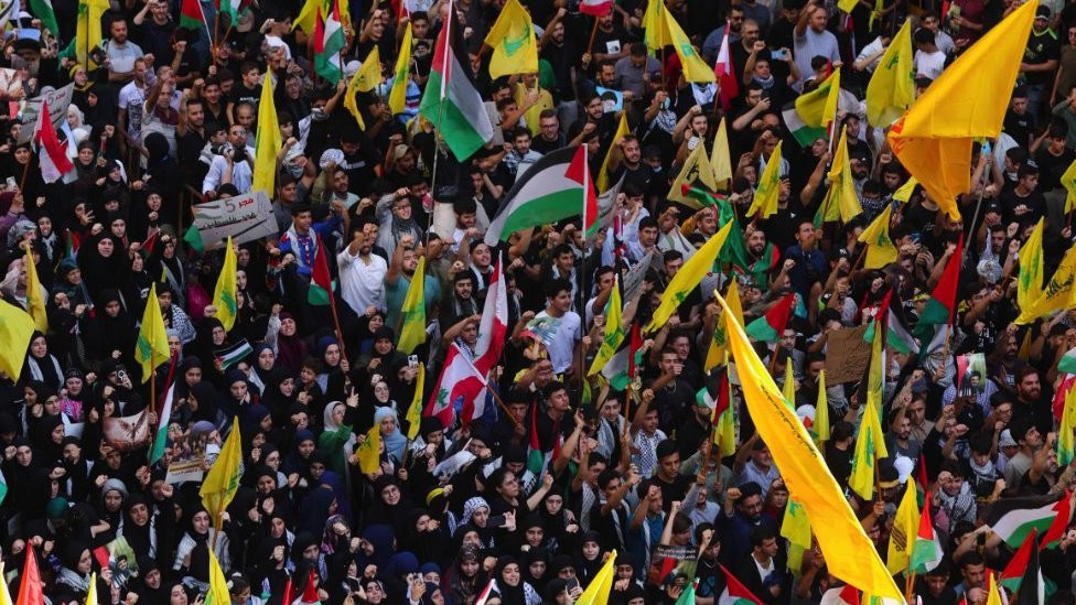 Crowds waving flags in Lebanon