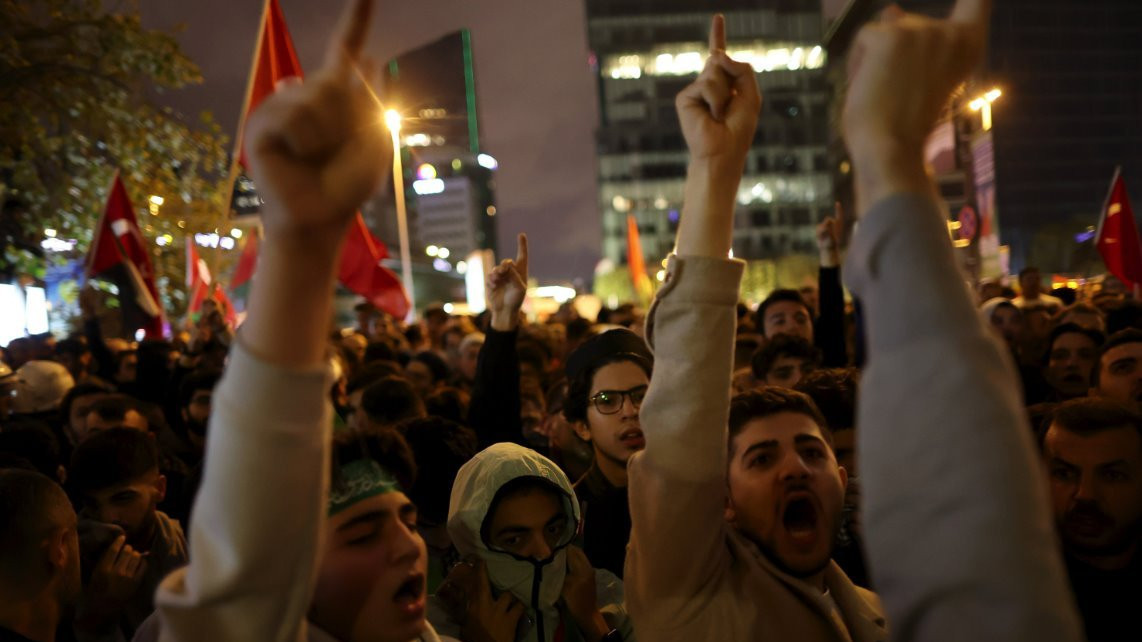 Protesters with fists in the air