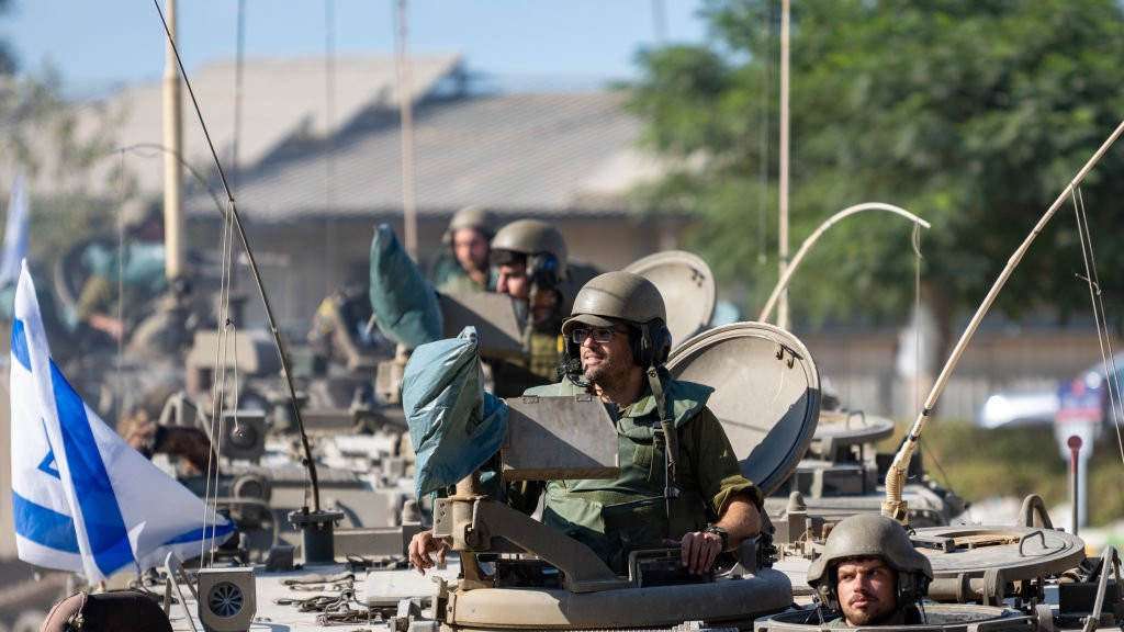 IDF Soldiers ride in armoured personnel carriers