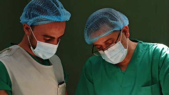 Dr Fadel Naim in an operating on a patient in theatre