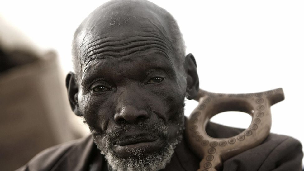 Kimani Maruge with his walking stick.