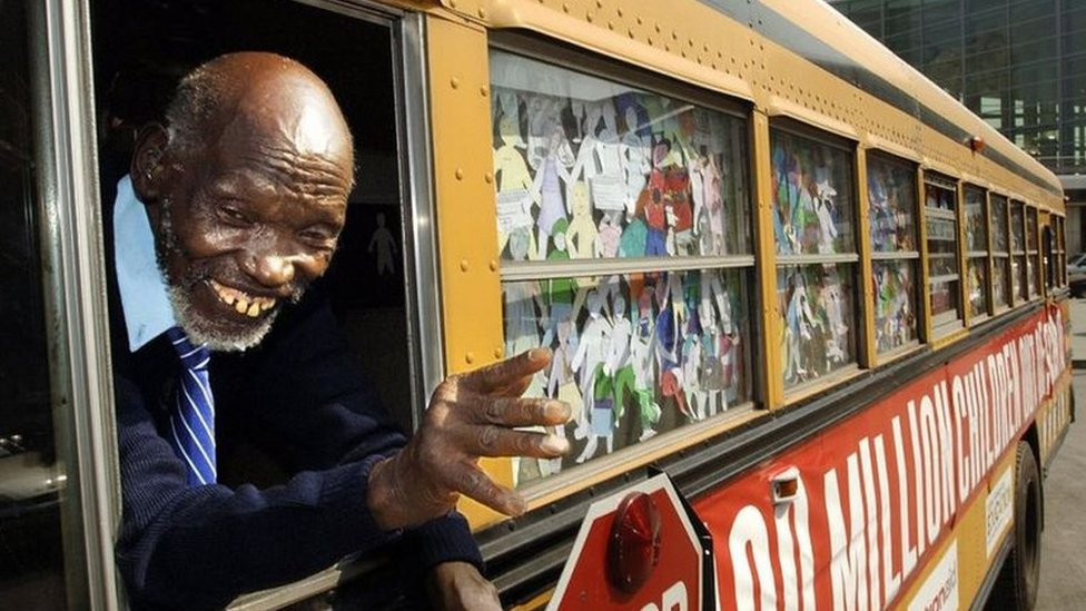 Kimani Maruge in a bus in New York.