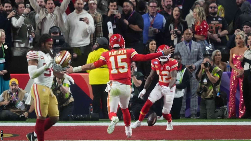 Patrick Mahomes and Mecole Hardman celebrate the game-winning touchdown in Super Bowl 58