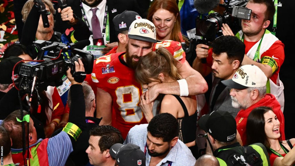Travis Kelce with Taylor Swift after winning Super Bowl 58