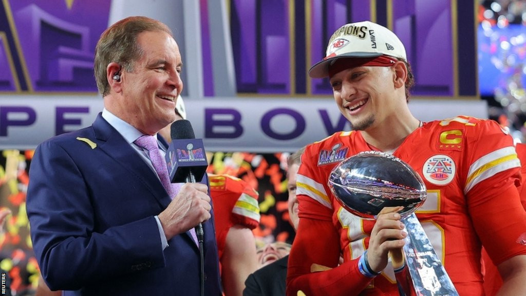 Patrick Mahomes is presenting with the Super Bowl trophy in 2024