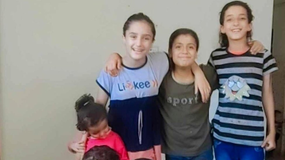 Alma (C) with her cousins before they were killed in a reported Israeli air strike in Gaza City in December 2023