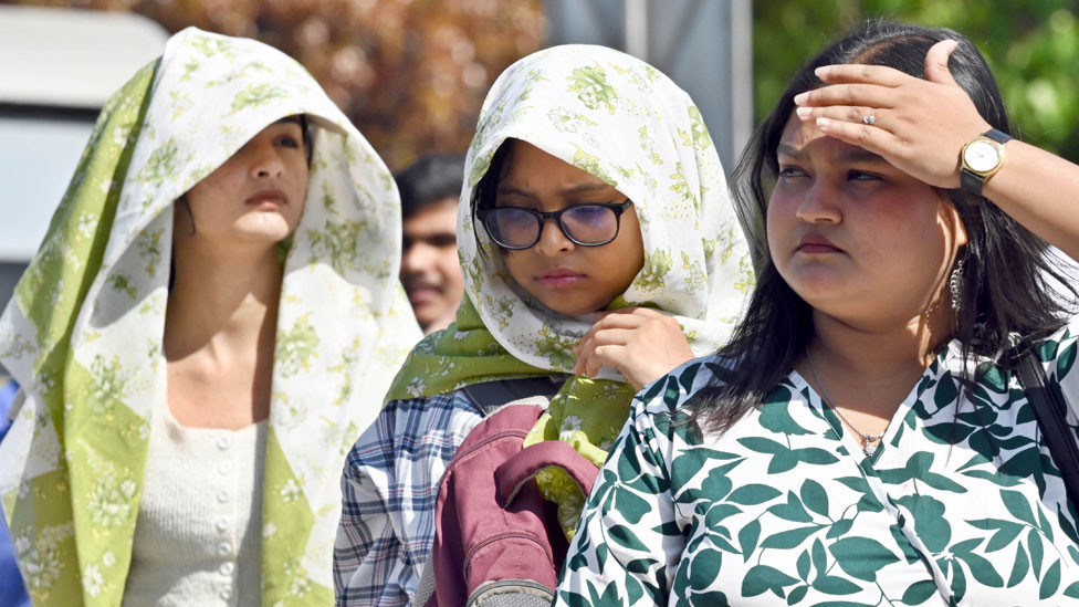 Three women in hot weather in India