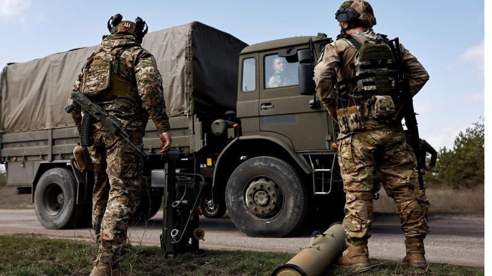 Ukrainian servicemen, call signs "Kapusta", 24 and "Maluk", 29, of an anti-tank unit of the 95th Brigade leave the area where they unveiled a Kornet guided missile launcher that the Ukrainian army claims they seized from Russian troops, now in use to combat against Russia's invasion of Ukraine, near Kreminna, Luhansk, Ukraine March 26, 2023.