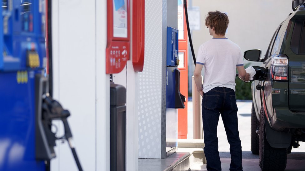 A customer refuels a vehicle at a Mobil gas station in Los Angeles, California, US, on Tuesday, April 2, 2024