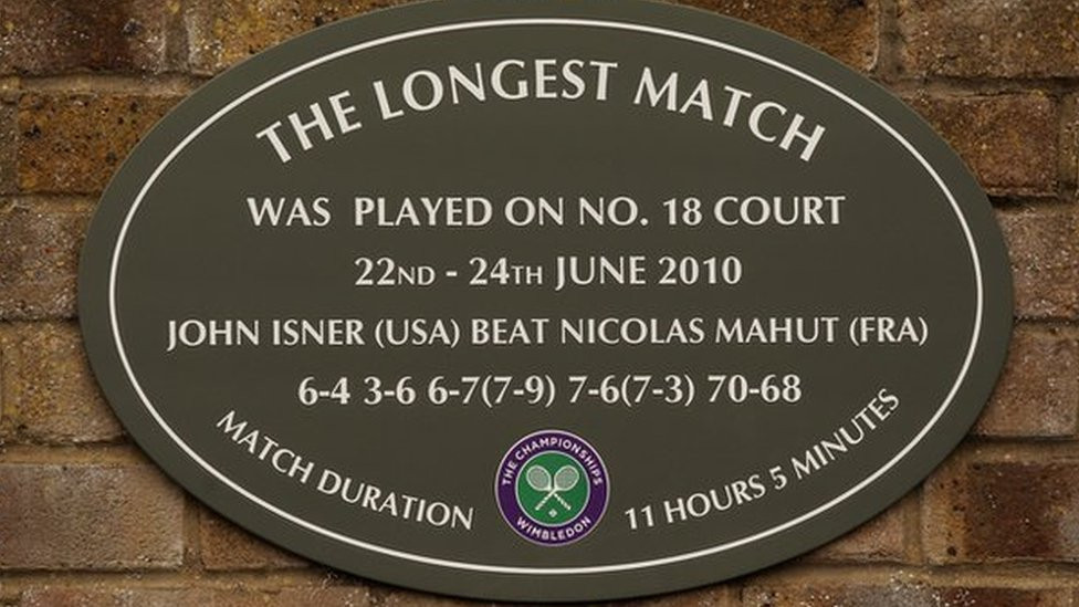 A plaque on court 18 at Wimbledon that commemorates the 2010 Wimbledon first-round match between John Isner and Nicolas Mahut