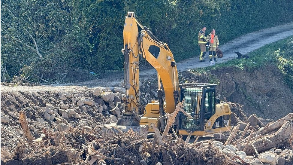 poplave u bosni, bager