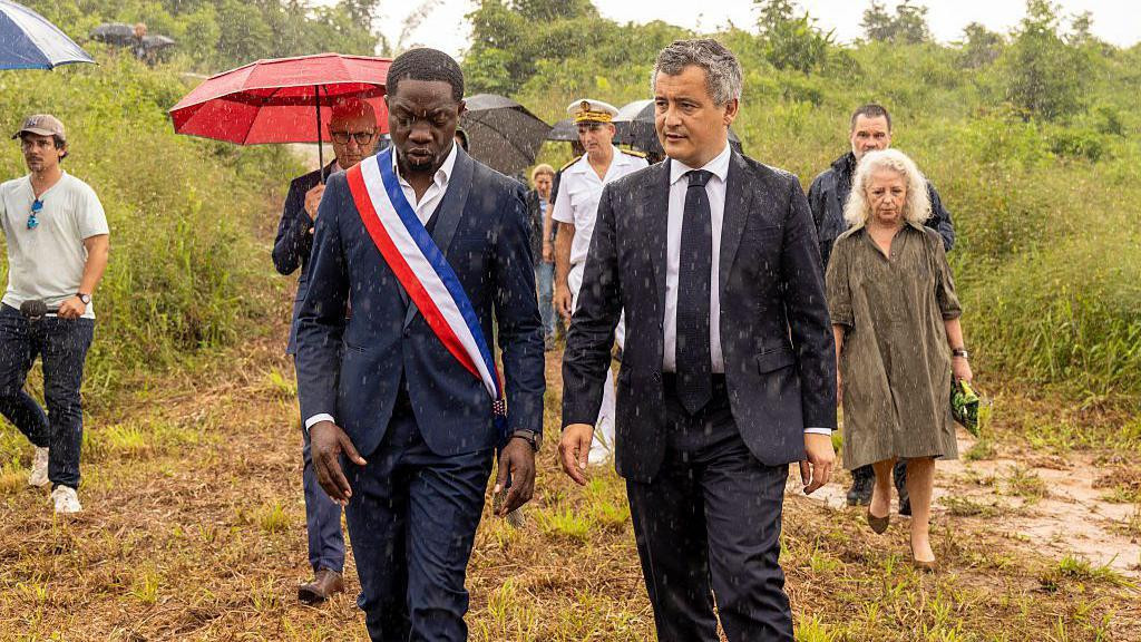 Gérald Darmanin walking through the Amazon rainforest 