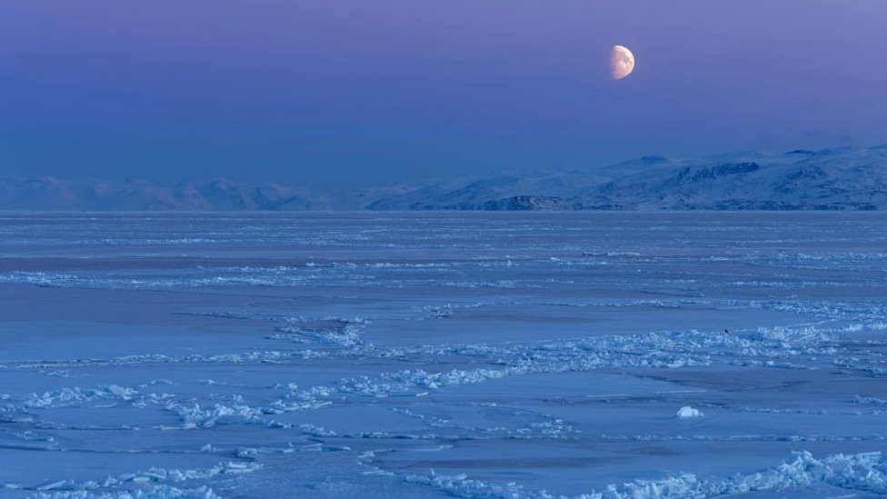 Moon over ice